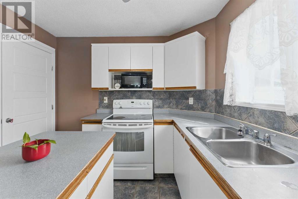 67 Martin Crossing Park Ne, Calgary, Alberta  T3J 3N7 - Photo 6 - A2210273