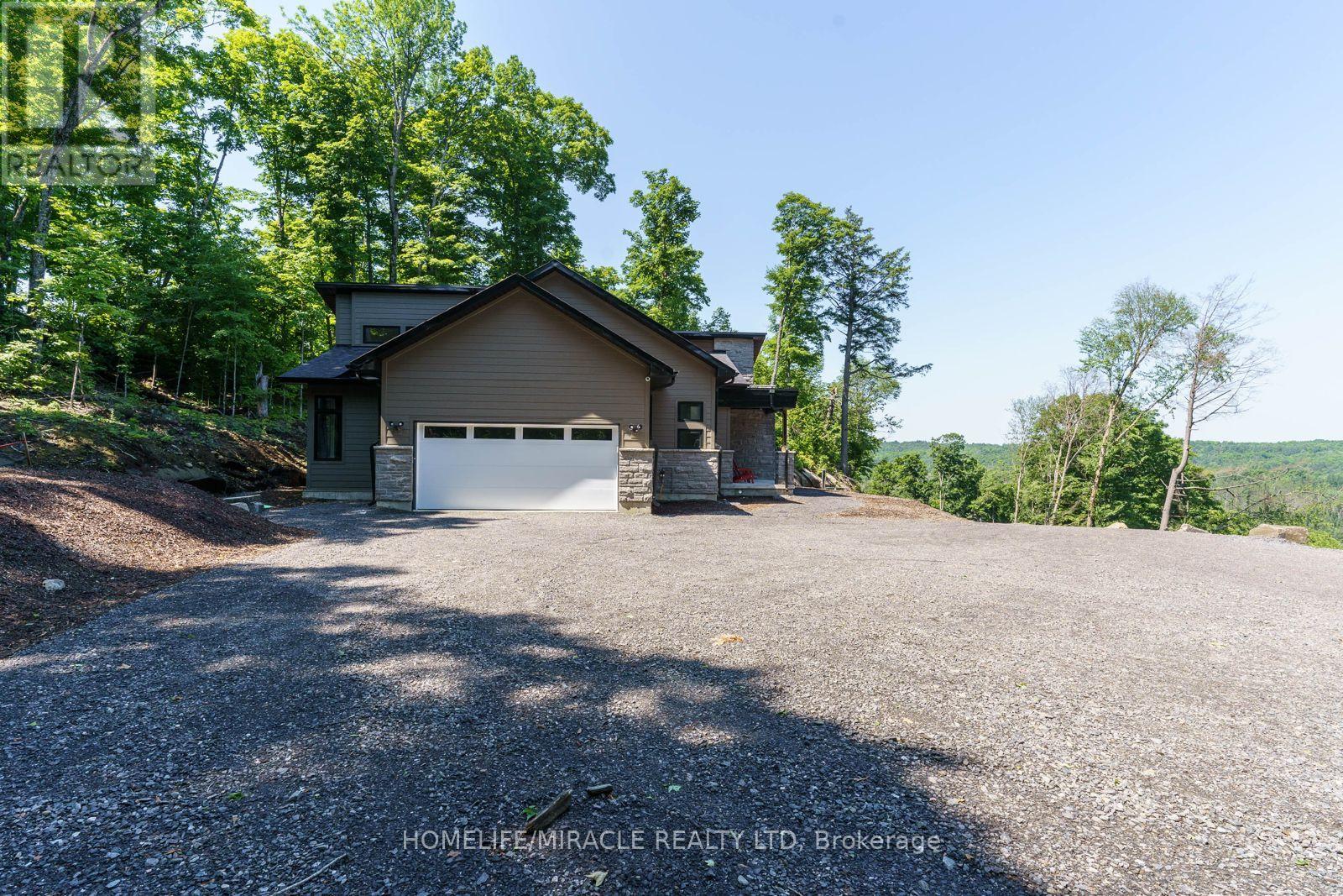 47 - 1057 Greensview Drive, Lake Of Bays, Ontario  P1H 1K0 - Photo 3 - X12126085