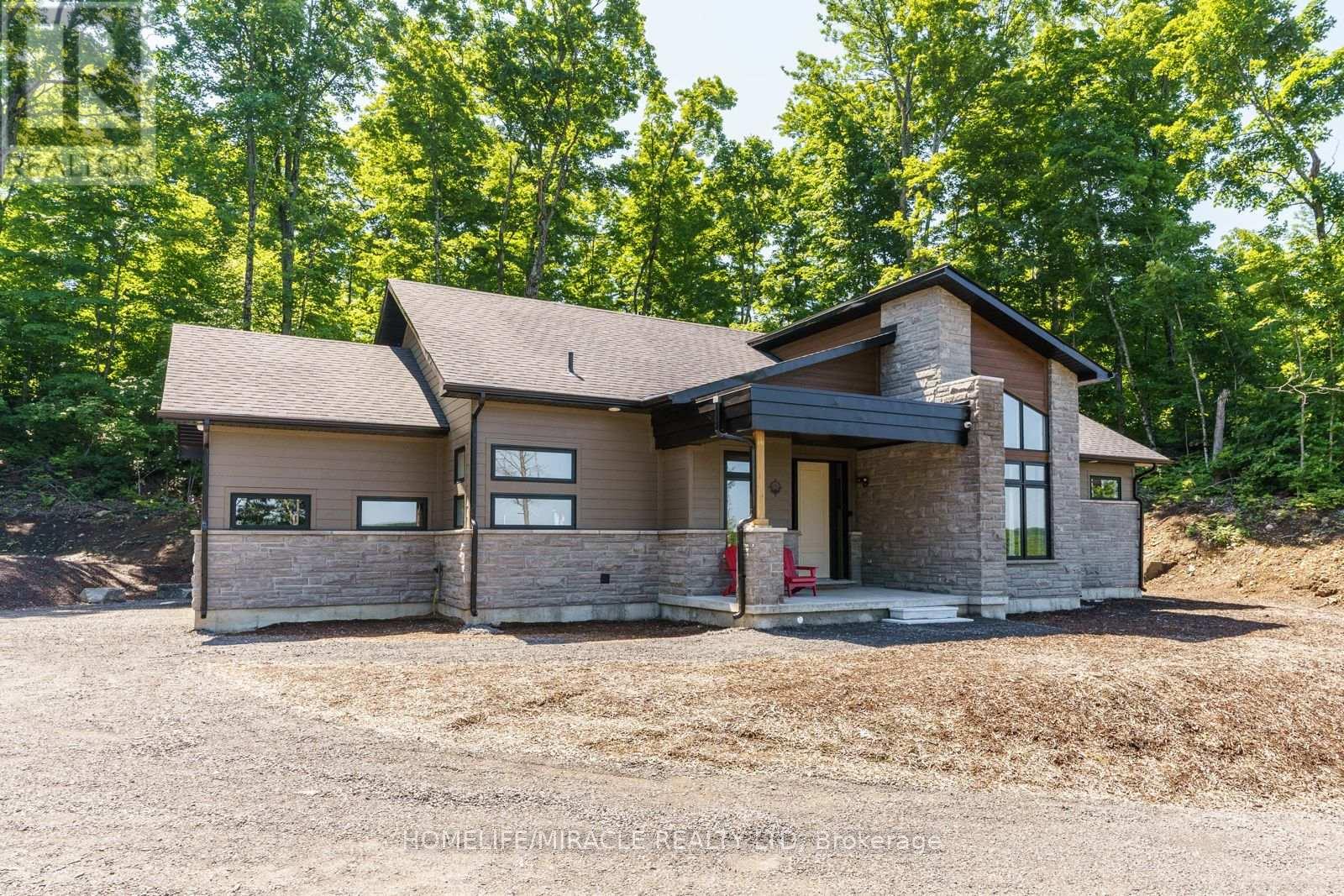 47 - 1057 Greensview Drive, Lake Of Bays, Ontario  P1H 1K0 - Photo 4 - X12126085