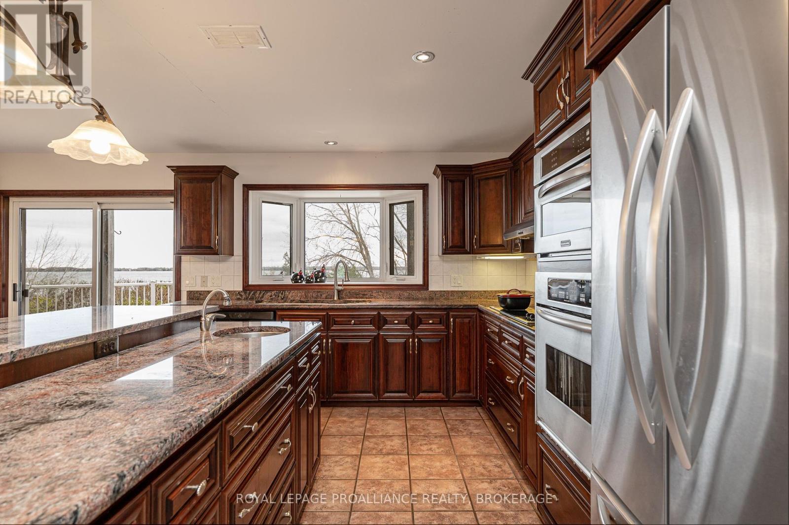 4734 Lakeside Lane, Loyalist, Ontario  K0H 1G0 - Photo 17 - X12126500