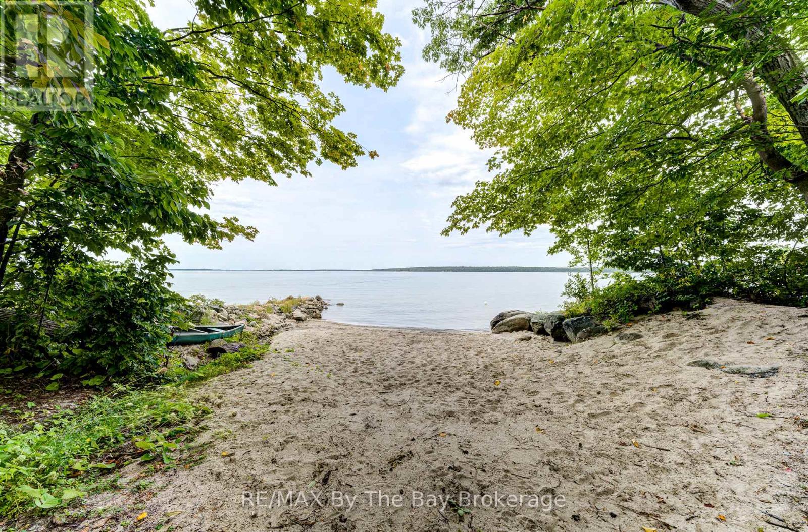 1584 Champlain Road, Tiny, Ontario  L9M 0C1 - Photo 3 - S12126466