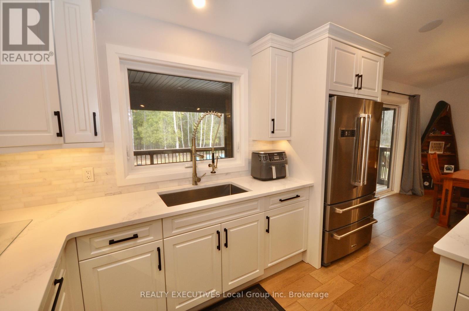 135 Hillside Lake Road, North Bay (Airport), Ontario  P1B 8G2 - Photo 7 - X12126712