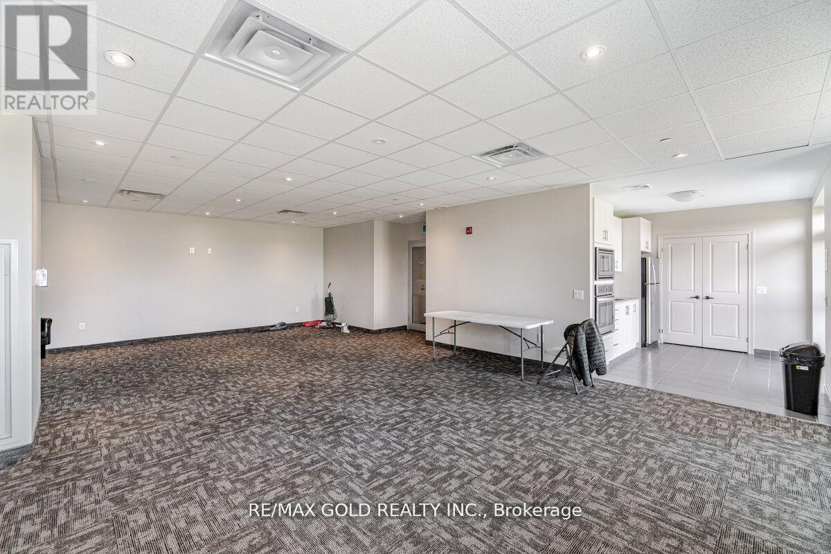 203 - 39 New Delhi Drive, Markham (Cedarwood), Ontario  L3S 0E1 - Photo 2 - N12126779