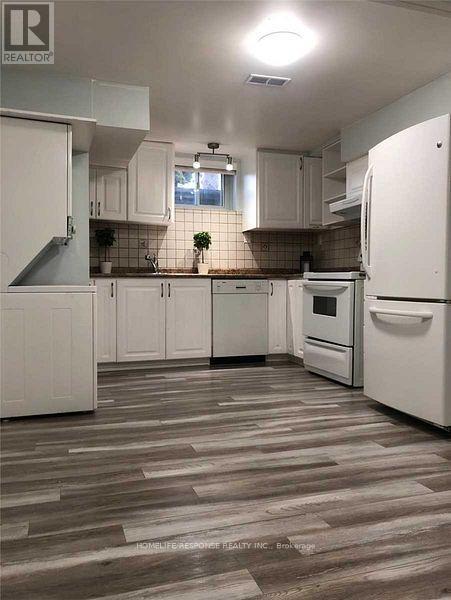 Lower - 25 Wilton Drive, Brampton, Ontario  L6W 2Z9 - Photo 2 - W12126858