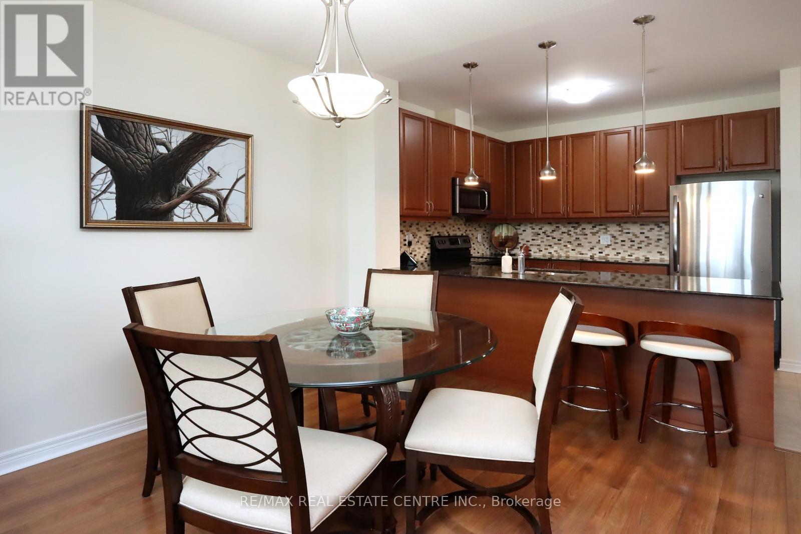 406 - 33 Whitmer Street, Milton, Ontario  L9T 8P9 - Photo 12 - W12127471