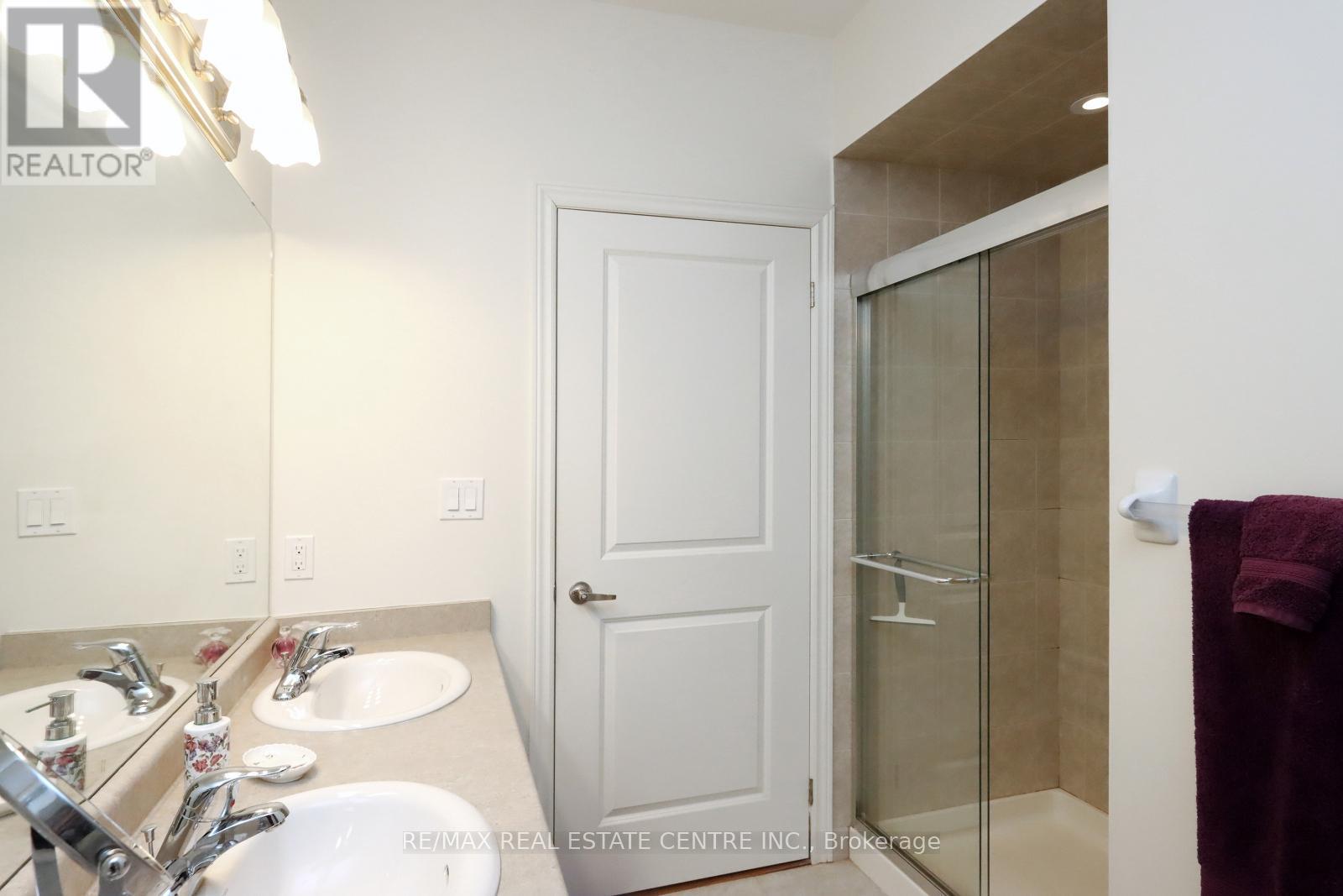 406 - 33 Whitmer Street, Milton, Ontario  L9T 8P9 - Photo 25 - W12127471