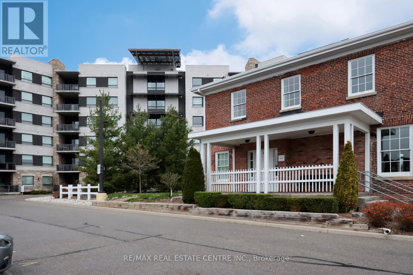 406 - 33 Whitmer Street, Milton, Ontario  L9T 8P9 - Photo 3 - W12127471