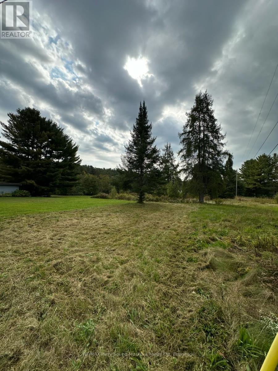 63 Pineridge Drive, Mcdougall, Ontario  P2A 2W9 - Photo 2 - X12116190