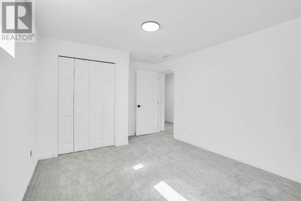 1013 Channelside Way Sw, Airdrie, Alberta  T4B 3J3 - Photo 30 - A2217447