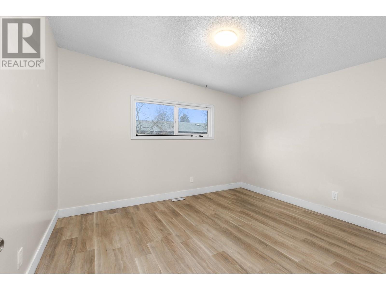 1357 Sylvania Crescent, Kelowna, British Columbia  V1X 5J4 - Photo 9 - 10343558