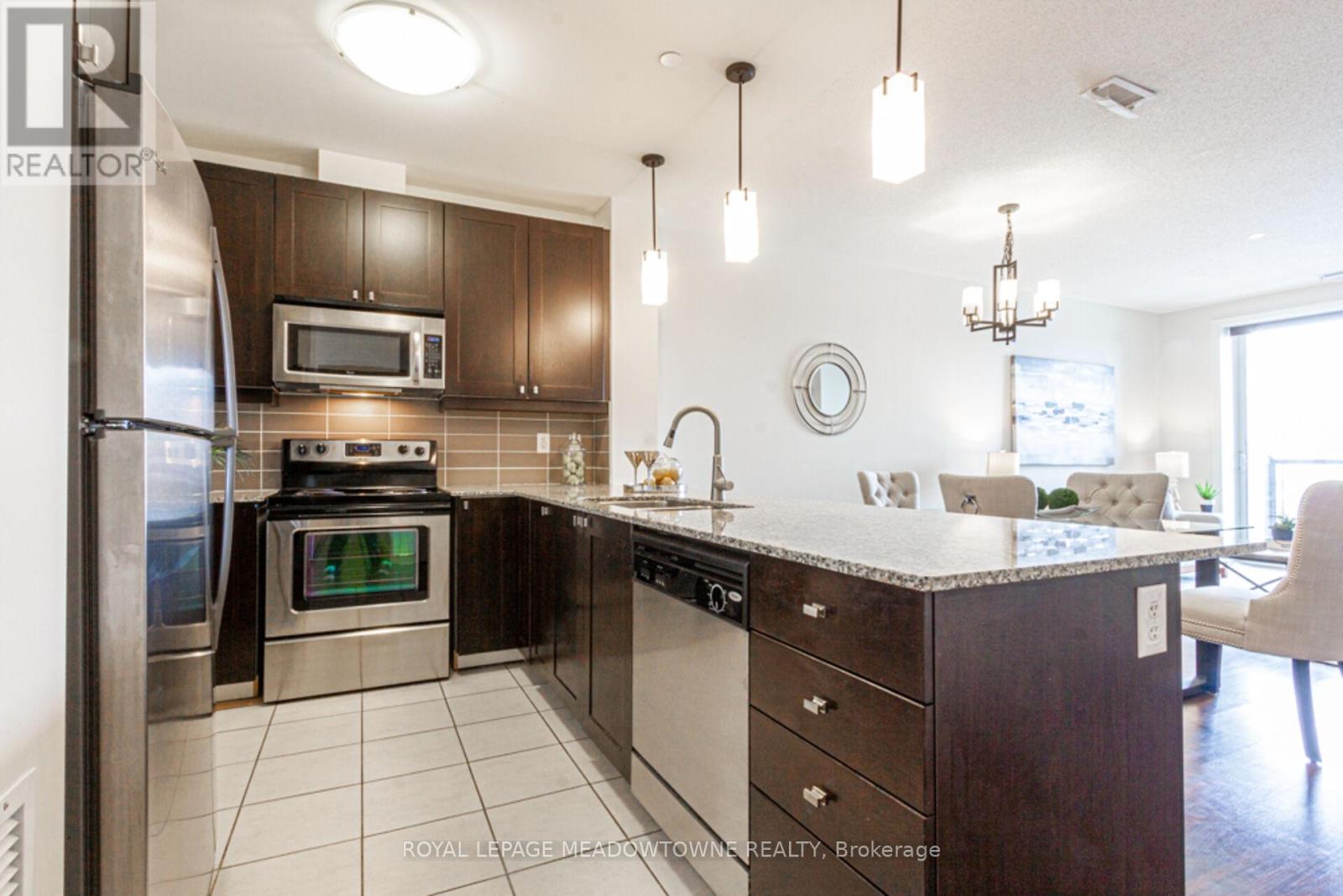 326 - 383 Main Street E, Milton (Om Old Milton), Ontario  L9T 8K8 - Photo 3 - W12128456