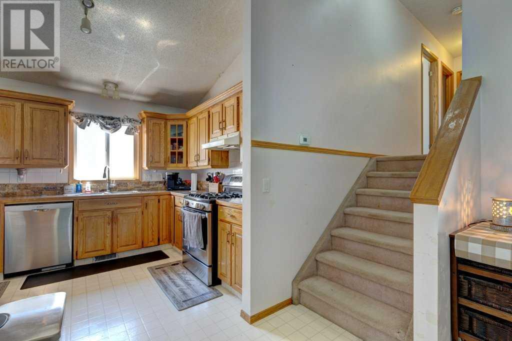 220 Sheep River Lane, Okotoks, Alberta  T1R 2B1 - Photo 9 - A2217658