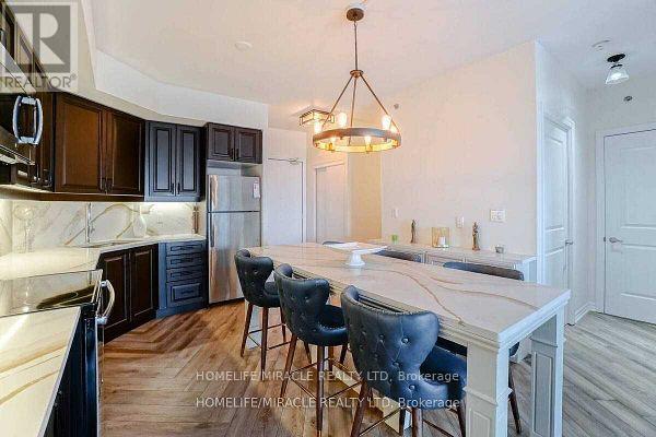 602 - 560 North Service Road, Grimsby, Ontario  L3M 0G3 - Photo 11 - X12128963