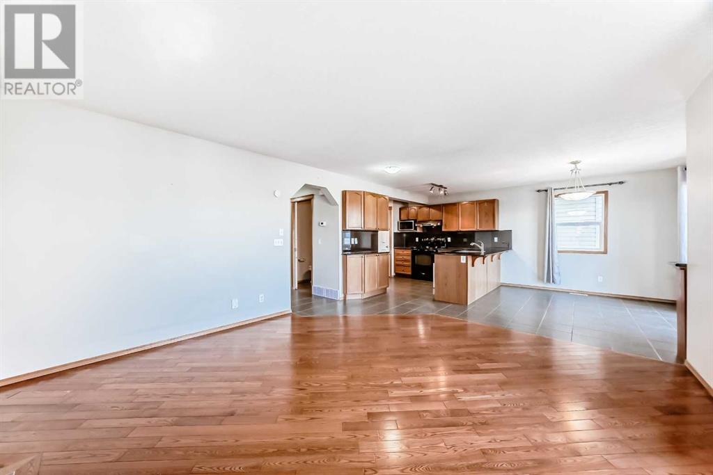 118 Panamount Villas Nw, Calgary, Alberta  T3K 0A3 - Photo 4 - A2217377