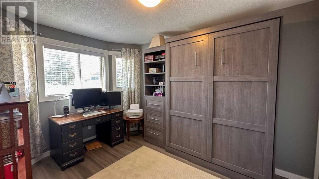 8, 210 Center Street Nw, Sundre, Alberta  T0M 1X0 - Photo 24 - A2216854