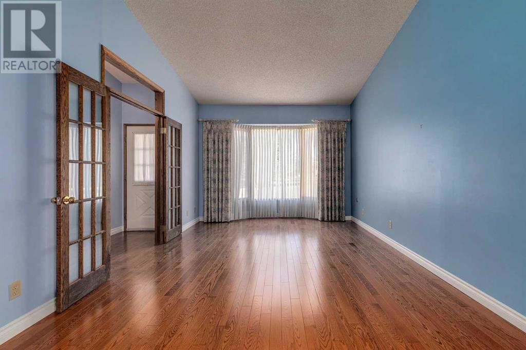 764 Coach Bluff Crescent Sw, Calgary, Alberta  T3H 1A8 - Photo 6 - A2218367
