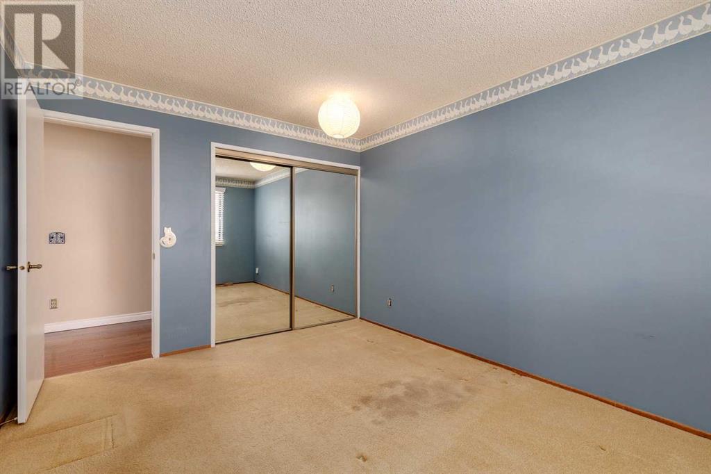 764 Coach Bluff Crescent Sw, Calgary, Alberta  T3H 1A8 - Photo 24 - A2218367