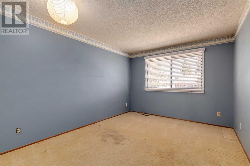 764 Coach Bluff Crescent Sw, Calgary, Alberta  T3H 1A8 - Photo 23 - A2218367