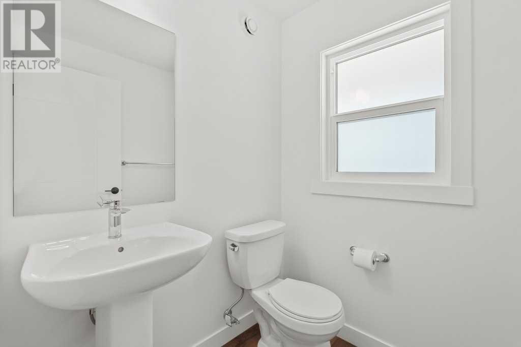 48 Rowmont Common, Calgary, Alberta  T3L 0L3 - Photo 21 - A2207368