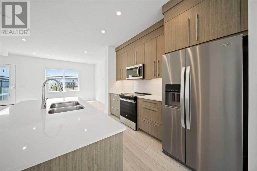 906, 135 Belmont Passage Sw, Calgary, Alberta  T2X 5X4 - Photo 4 - A2218279