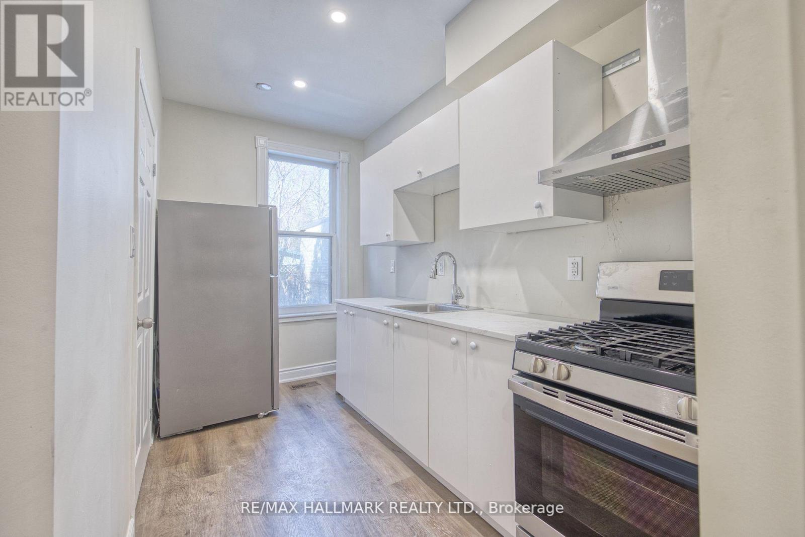 Main - 46 Springhurst Avenue, Toronto, Ontario  M6K 1B6 - Photo 2 - W12129757