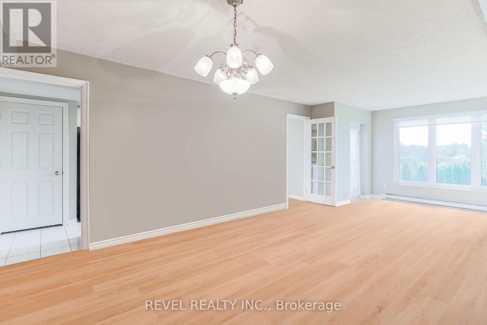 102 - 50 Rivermill Boulevard, Kawartha Lakes, Ontario  K9V 6C1 - Photo 11 - X12130368