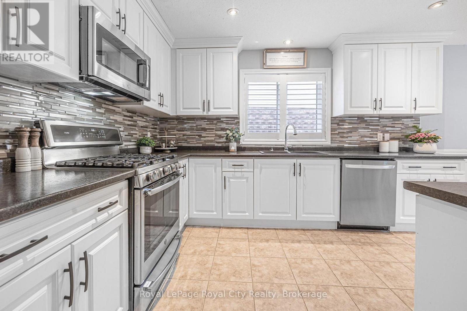 38 Marshall Drive, Guelph, Ontario  N1E 0K7 - Photo 6 - X12118431
