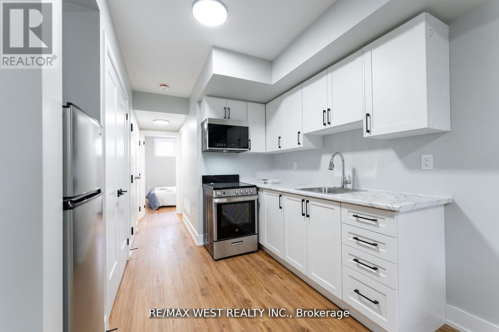 Lower - 411 Main Street, Toronto, Ontario  M4C 4Y1 - Photo 7 - E12130896
