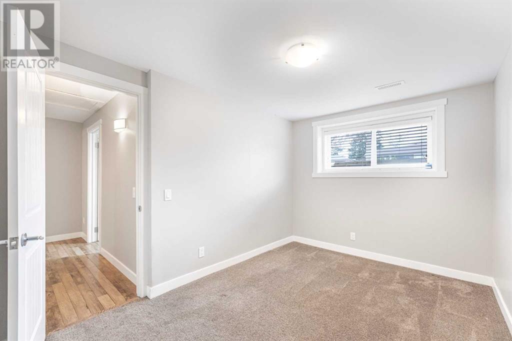 148 Baird Avenue, Cochrane, Alberta  T4C 1C7 - Photo 30 - A2205808
