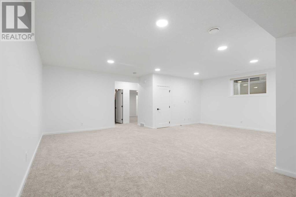 296 Spring Creek Circle Sw, Calgary, Alberta  T3H 6G4 - Photo 35 - A2218176