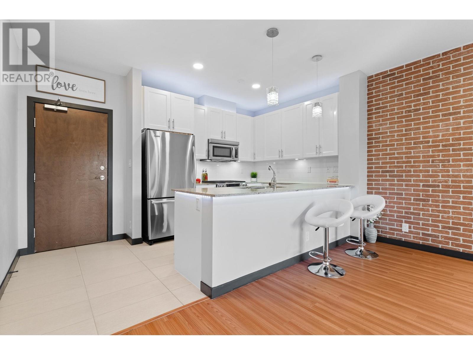 416 101 Morrissey Road, Port Moody, British Columbia  V3H 0E6 - Photo 1 - R2999866