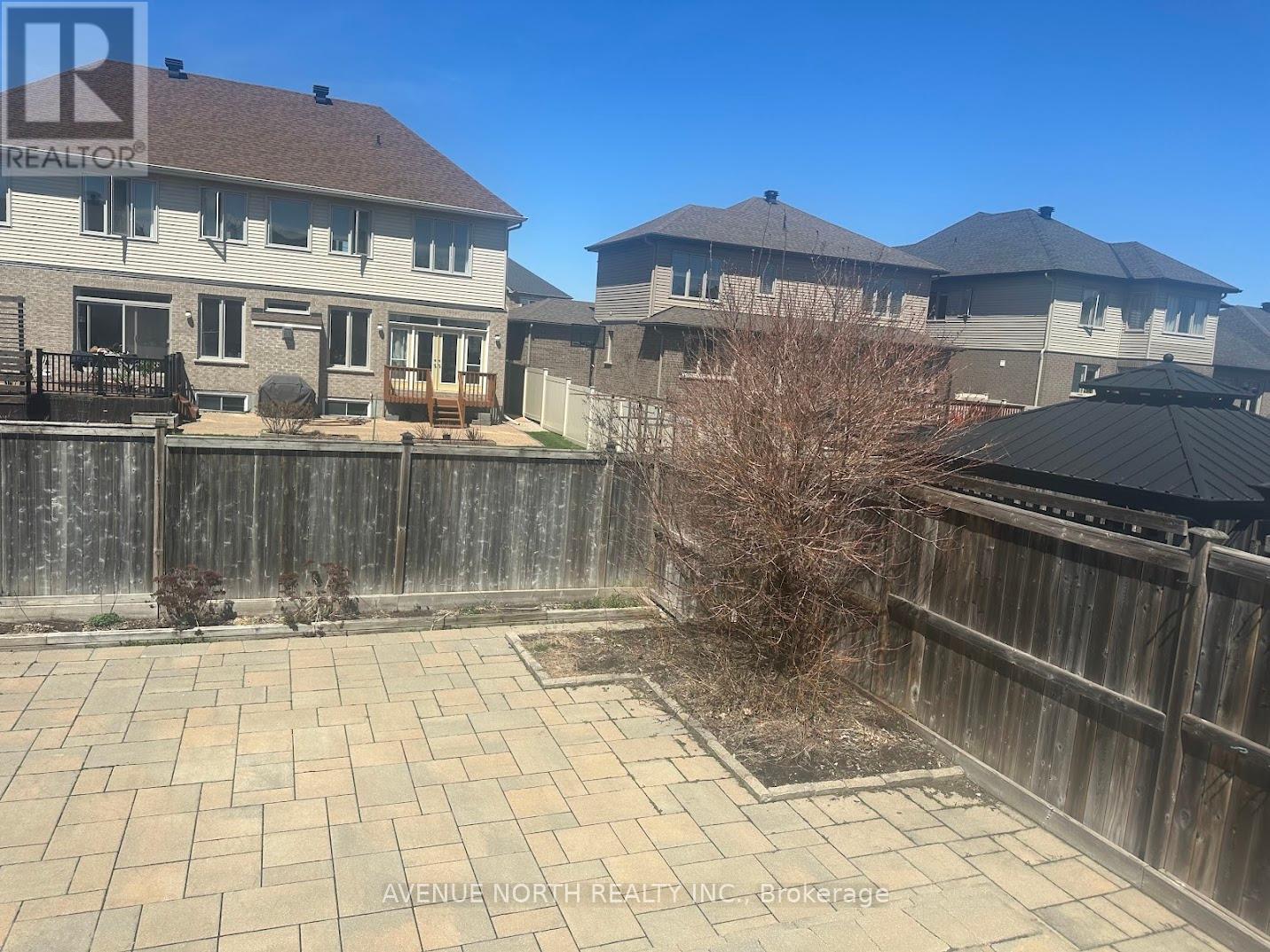238 Tewsley Drive, Ottawa, Ontario  K1V 0Y6 - Photo 2 - X12132366