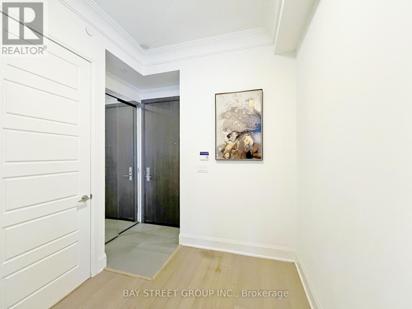 201 - 25 Water Walk Drive, Markham, Ontario  L6G 0G3 - Photo 3 - N12132594