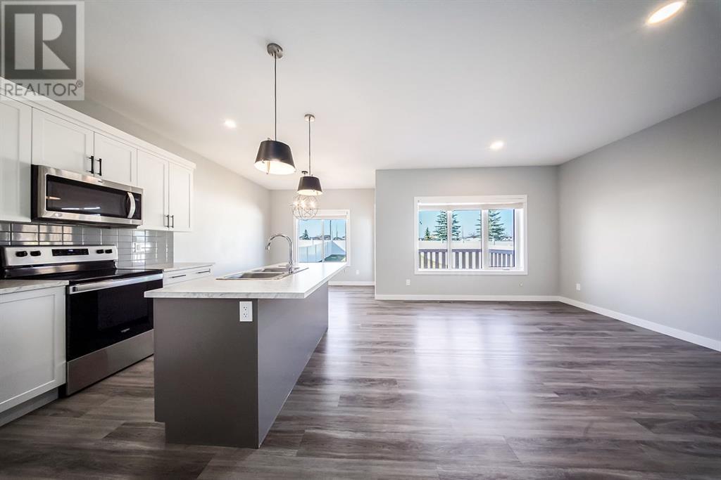 88 Henderson Crescent, Penhold, Alberta  T0M 1R0 - Photo 3 - A2218954