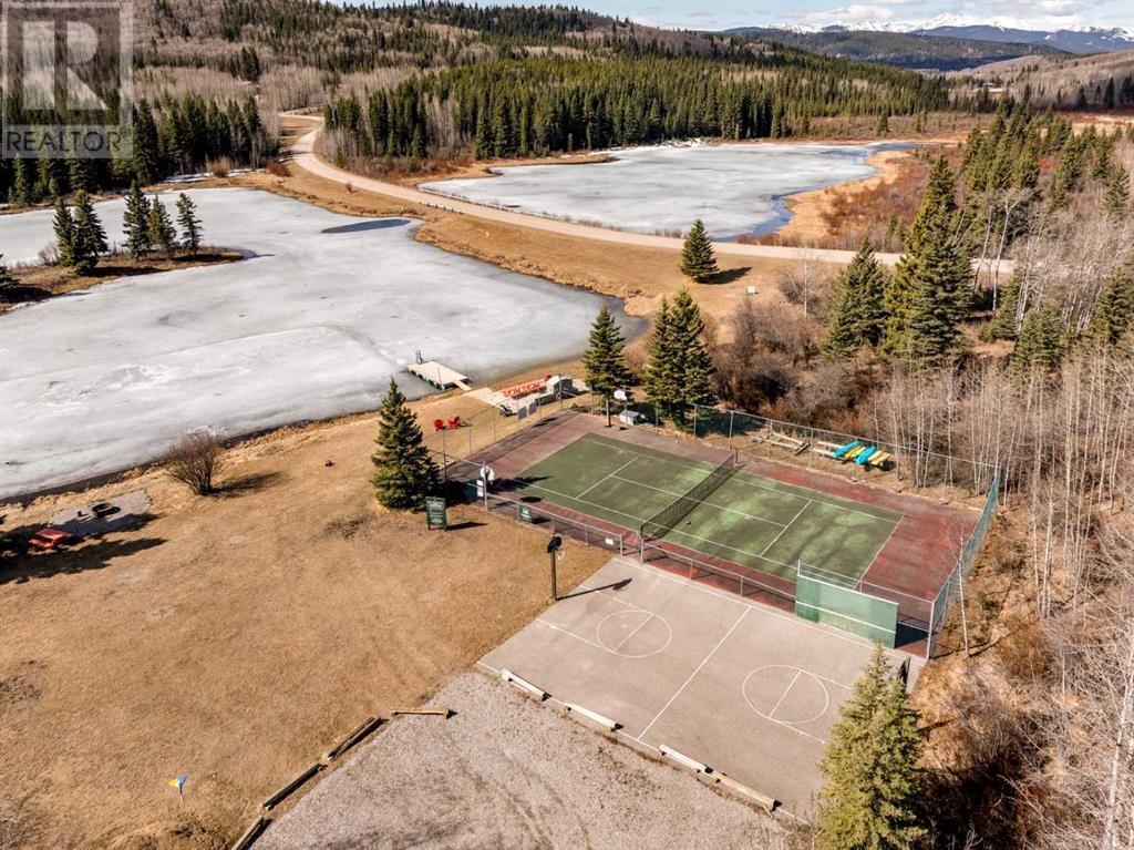 111 Wild Rose Close, Bragg Creek, Alberta  T0L 0K0 - Photo 10 - A2212363