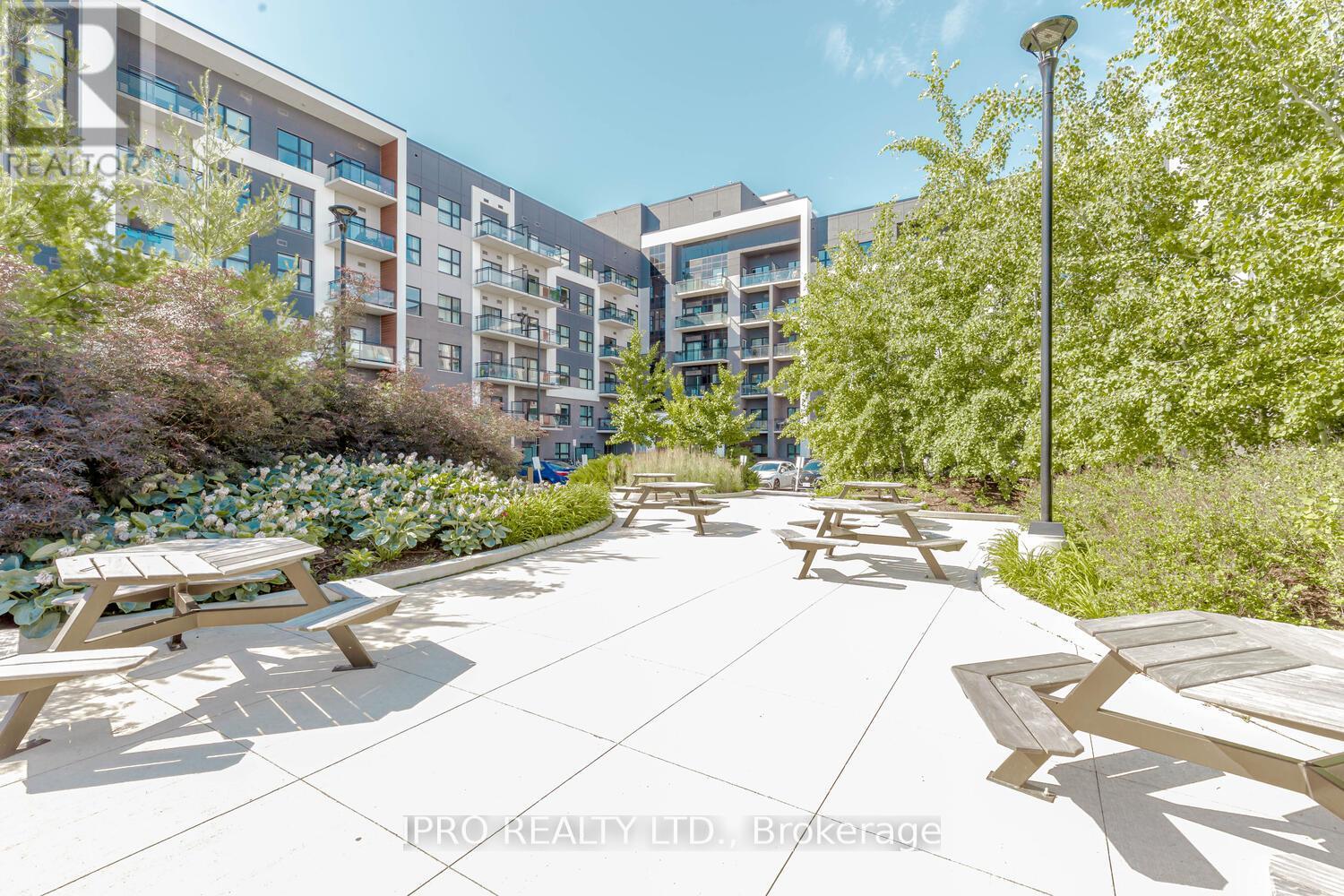 318 - 128 Grovewood Common, Oakville (Go Glenorchy), Ontario  L6H 0X3 - Photo 4 - W12132818