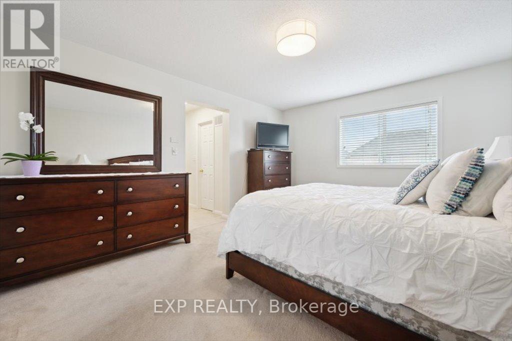 1547 Dinsmore Drive, Milton (Be Beaty), Ontario  L9T 5L5 - Photo 19 - W12132934