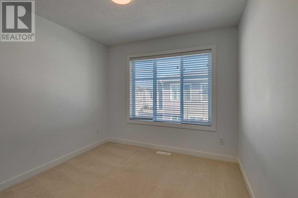 303, 669 Savanna Boulevard Ne, Calgary, Alberta  T3J 2K2 - Photo 25 - A2199102