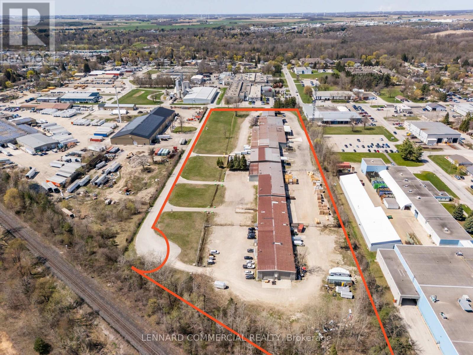 1  Firestone Road  Strathroy-Caradoc (SE), Ontario Rare fully occupied investment opportunity offering approximately 7% cap rate currently with upside as high as 9% within four years due to escalations and lease renewals. High-quality roster of tenants who plan to stay long-term. Flexible zoning allows outside storage and property sits on 12.2 total acres with approximately 4 acres of unutilized excess land for future development potential to add additional units or for outside storage usage. Extensively upgraded building with new LED lighting, new exterior and interior metal cladding, new electrical wiring, and other work too extensive to list - $2.2 million spent on upgrades over last 8 years. Great building specs with 20 ft clear height in 80% of the building and 16 ft clear height in 20% of the building, and abundant dock-level and drive-in shipping doors. (id:48254)