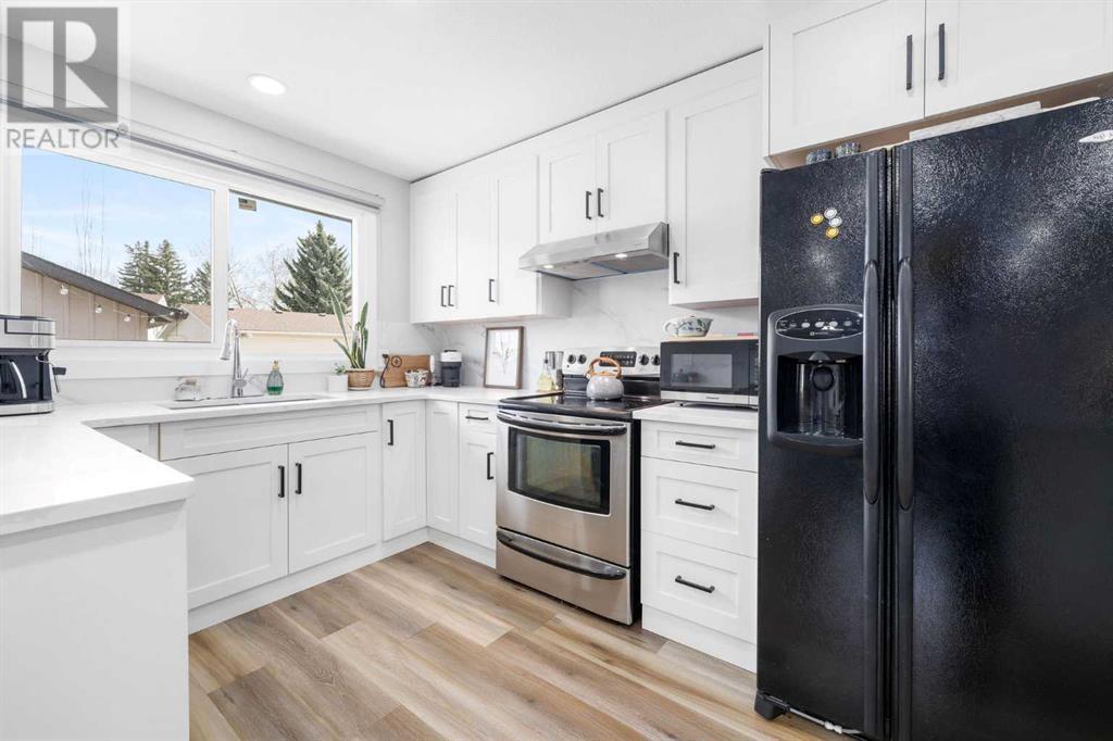 448 Queen Charlotte Road Se, Calgary, Alberta  T2J 4H7 - Photo 14 - A2218327