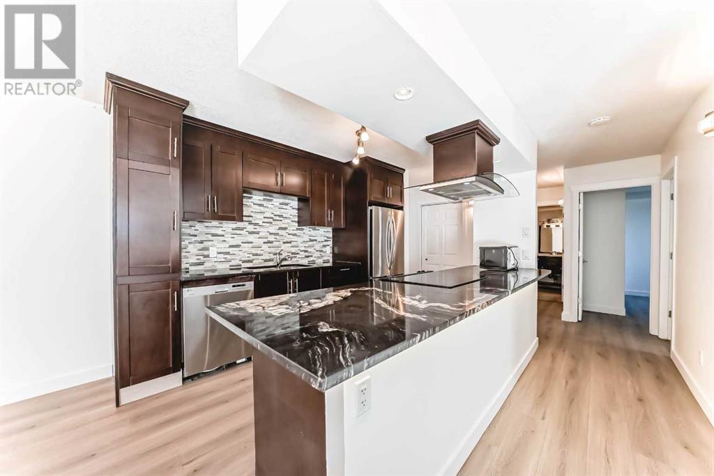 Property at 212, 111 14 Avenue SE image 3