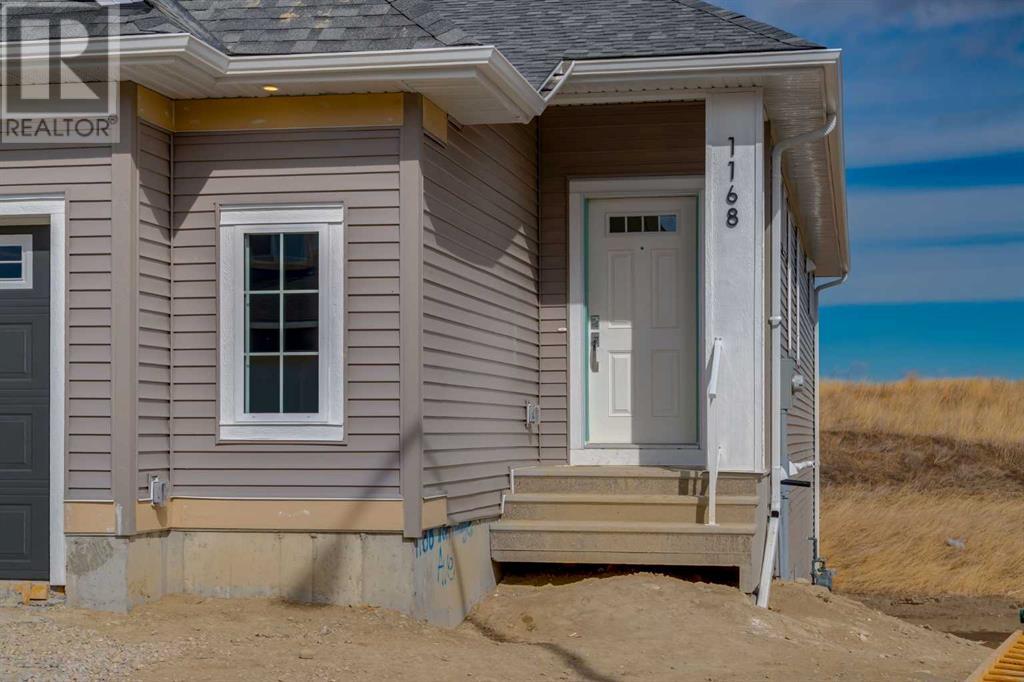 1168 Iron Ridge Avenue, Crossfield, Alberta  T0M 0S0 - Photo 2 - A2191248