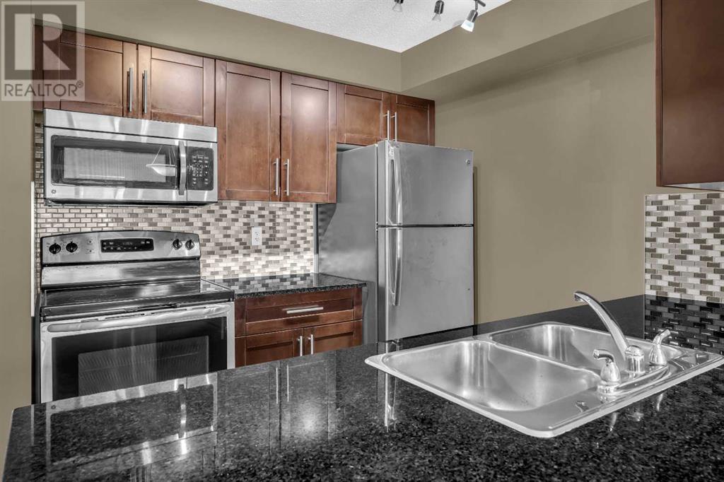 9212, 403 Mackenzie Way, Airdrie, Alberta  T4B 3V7 - Photo 1 - A2211705