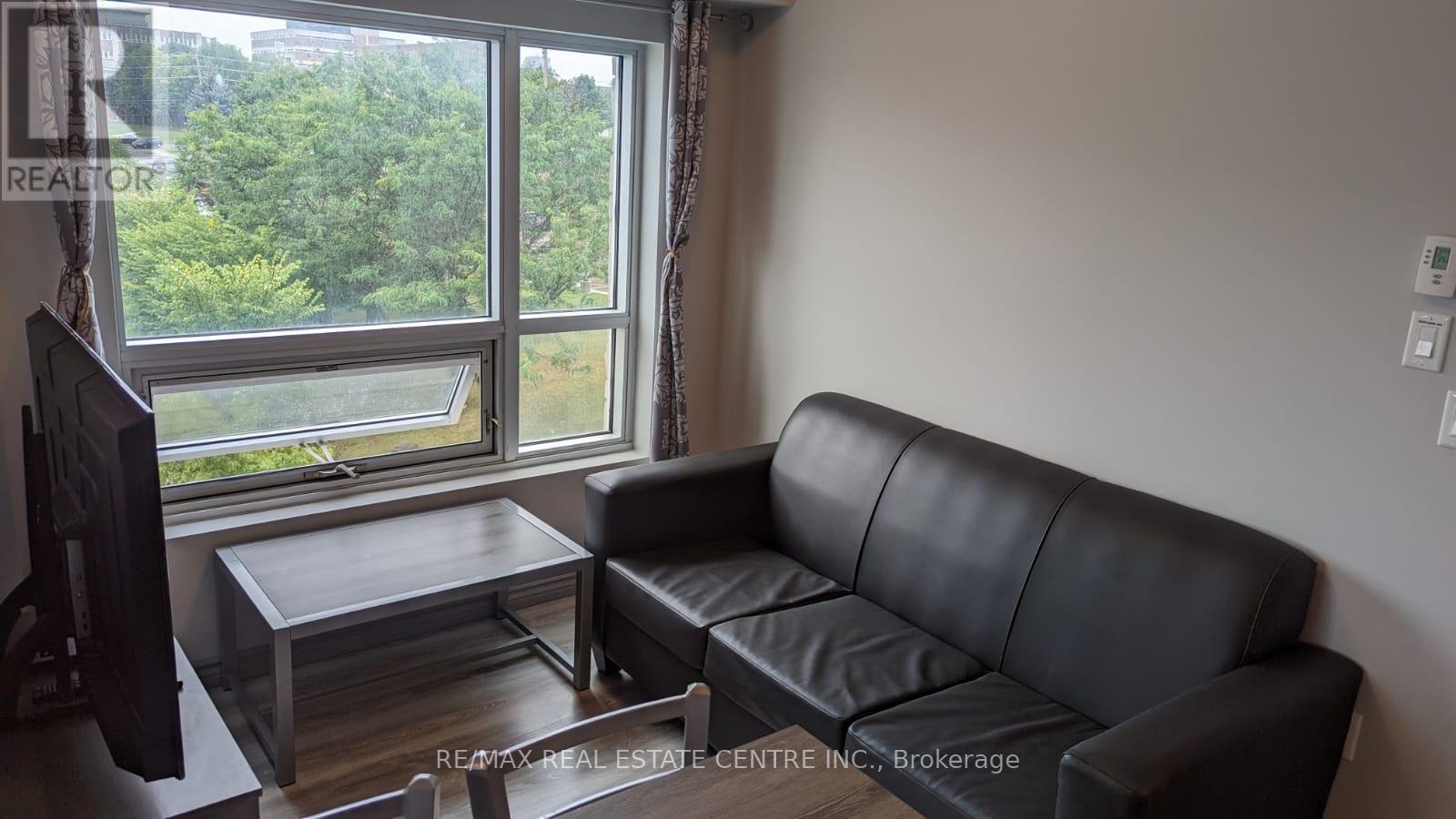 301b - 275 Larch Street, Waterloo, Ontario  N2L 3R2 - Photo 9 - X12134461