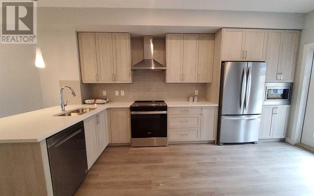 734 Sage Hill Grove Nw, Calgary, Alberta  T3R 2A2 - Photo 5 - A2209473