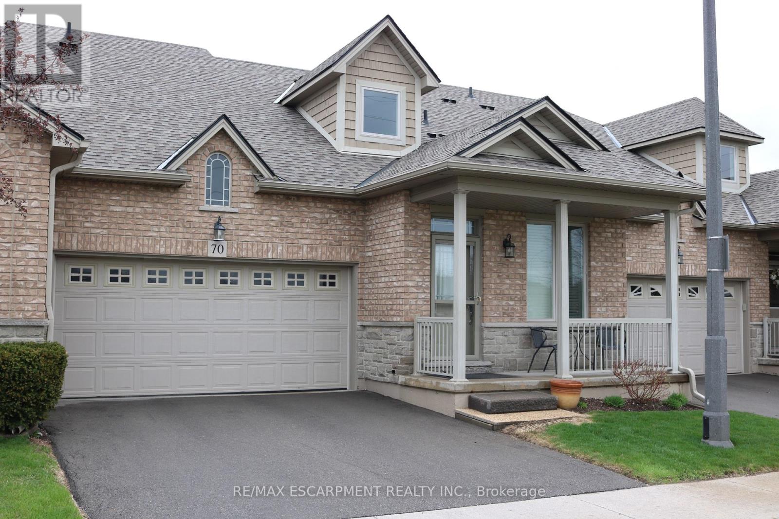 70 - 2165 Itabashi Way, Burlington, Ontario  L7M 0A2 - Photo 1 - W12134833