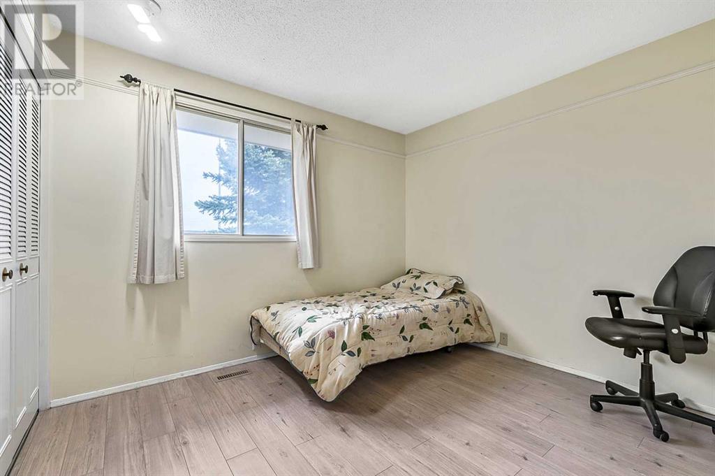583 Woodpark Crescent Sw, Calgary, Alberta  T2W 2S1 - Photo 16 - A2218873