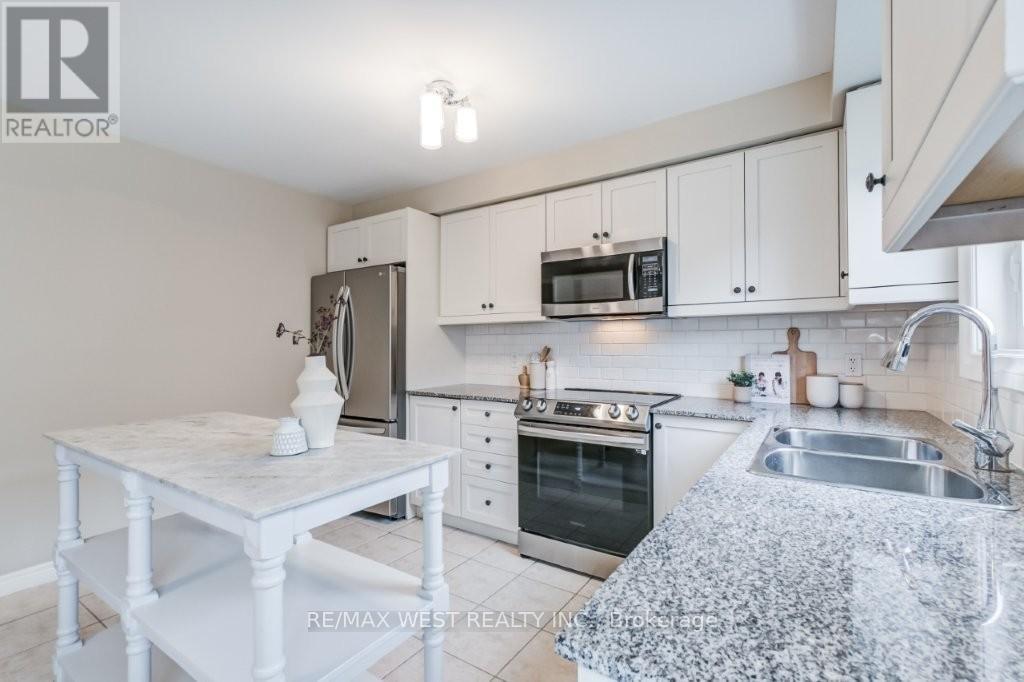 61 - 2280 Baronwood Drive, Oakville, Ontario  L6M 5J8 - Photo 13 - W12136238