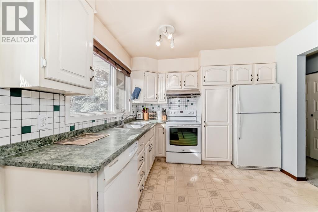 115 Rundleview Drive Ne, Calgary, Alberta  T1Y 1H7 - Photo 7 - A2198547