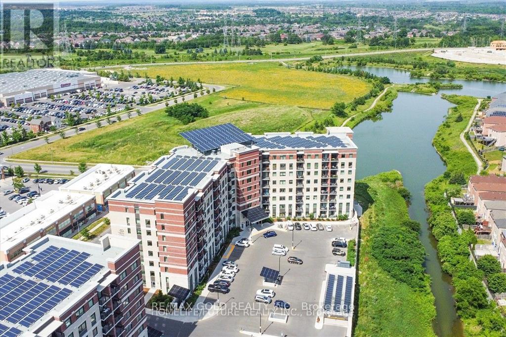 203 - 39 New Delhi Drive, Markham, Ontario  L3S 0E1 - Photo 2 - N12126779